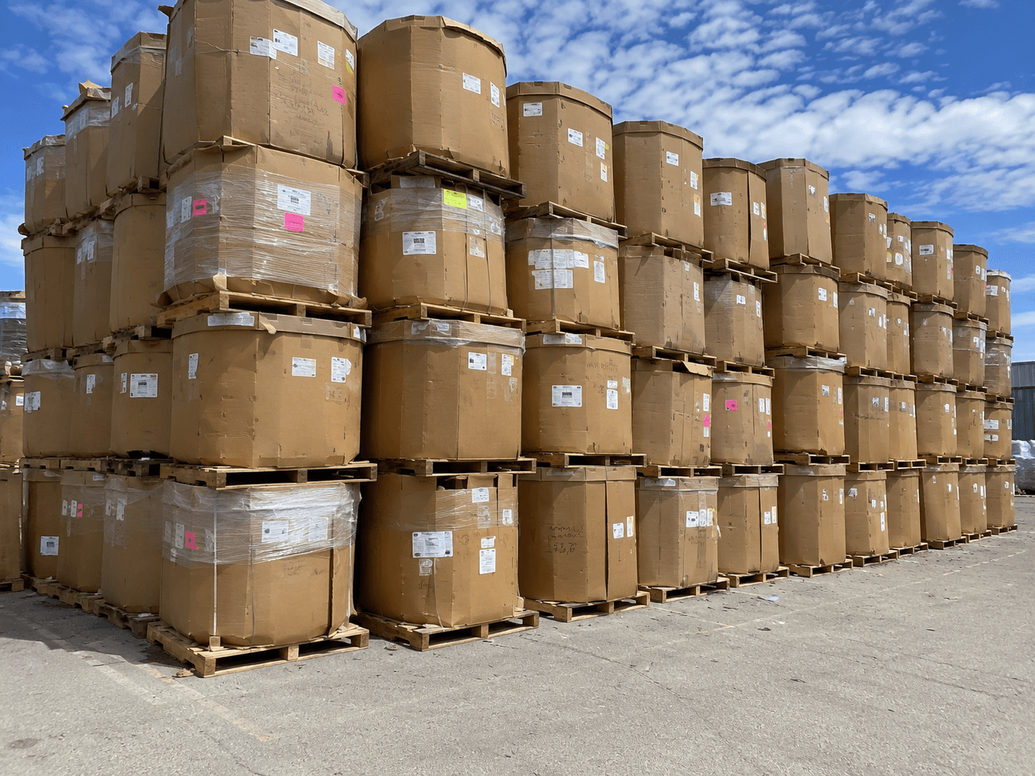 Stacked recovered fiber staged outdoors