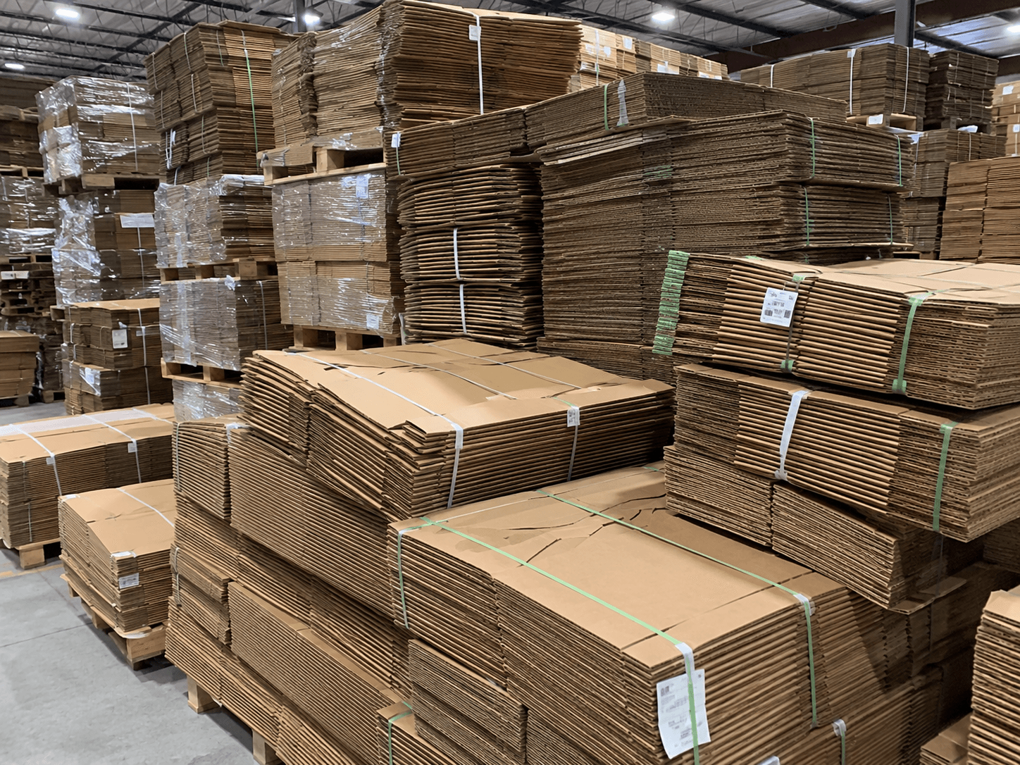 Bundled used corrugated cartons on pallets